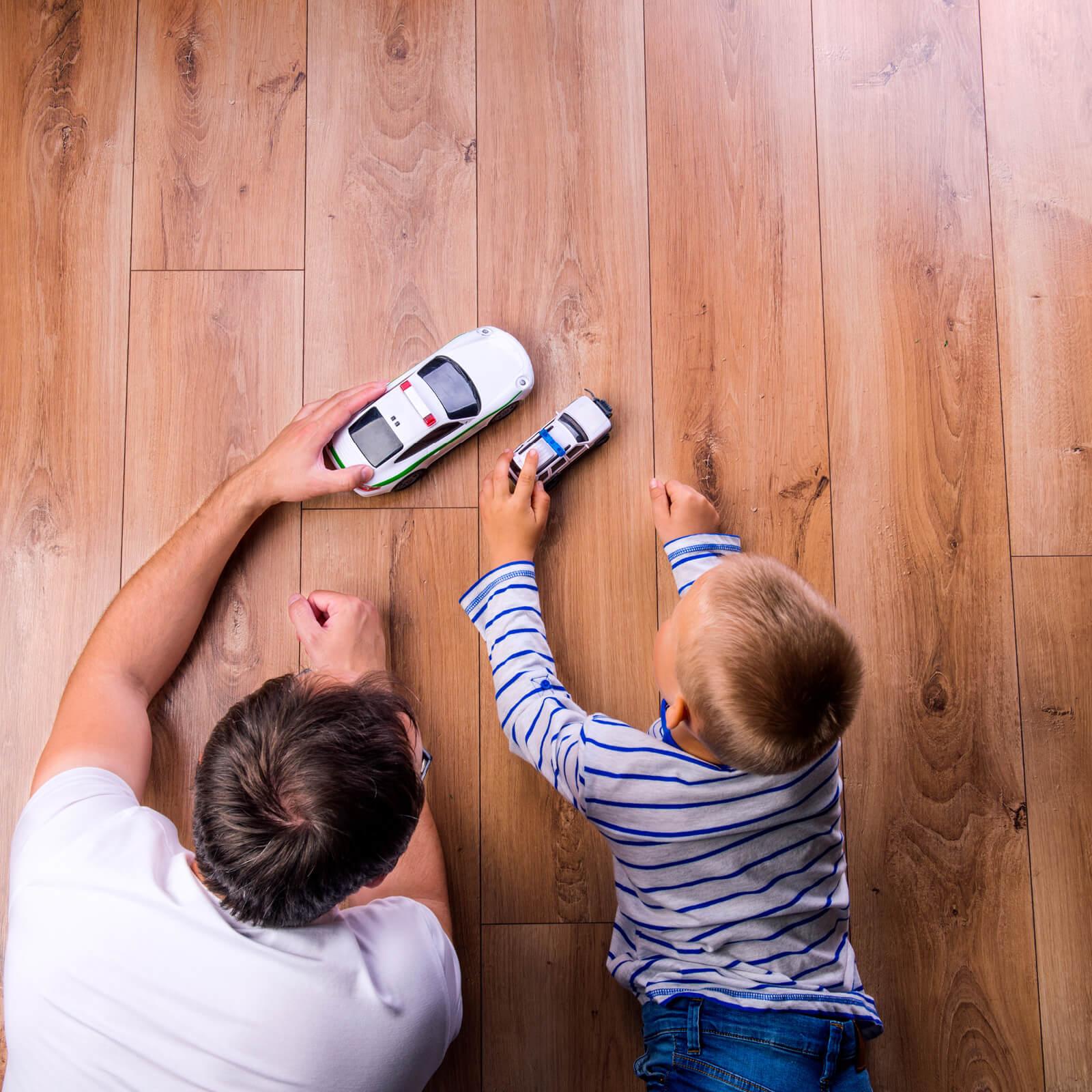 Kid playing with toy car | Flooring Direct