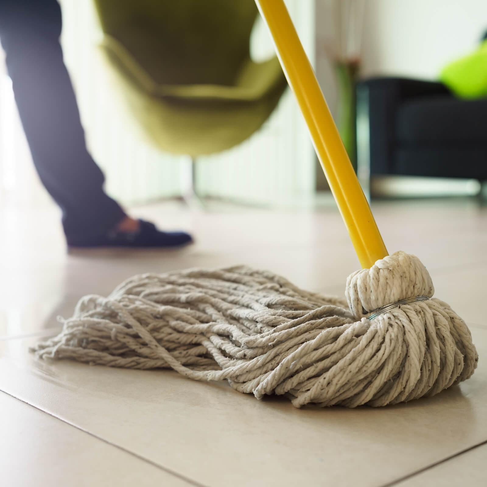 Mopping a tile floor | Flooring Direct