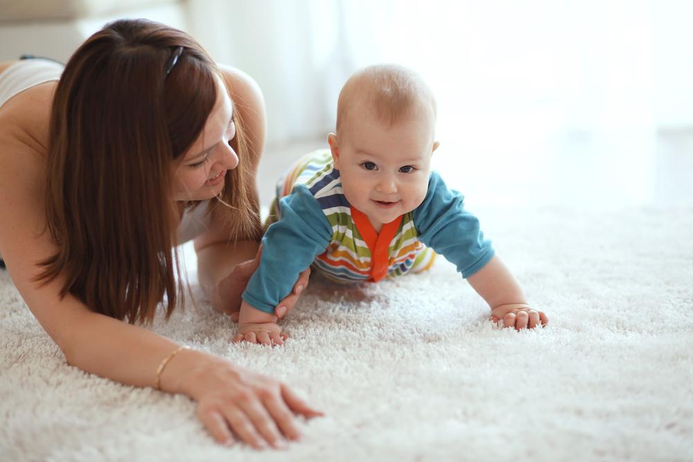 Mom playing with baby | Flooring Direct
