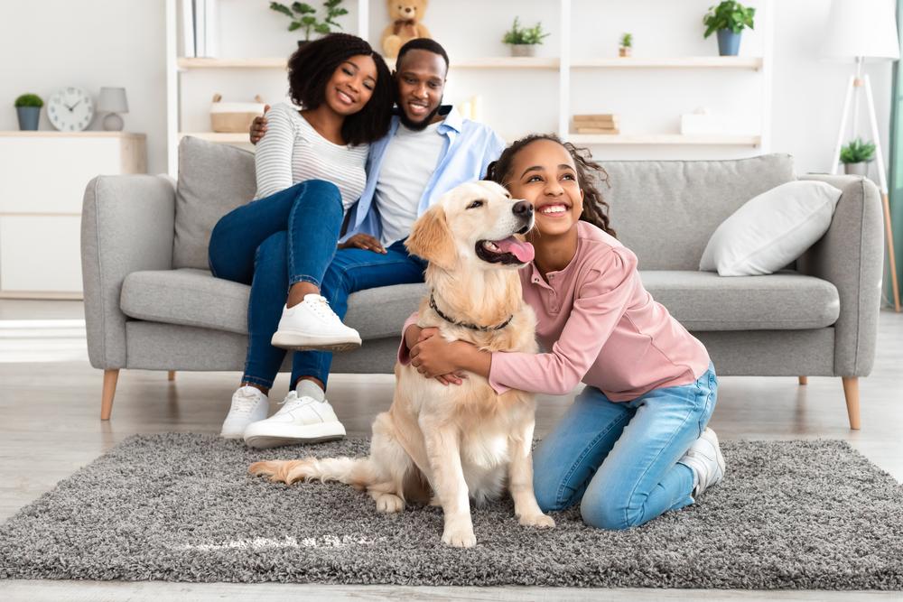Happy family with dog | Flooring Direct