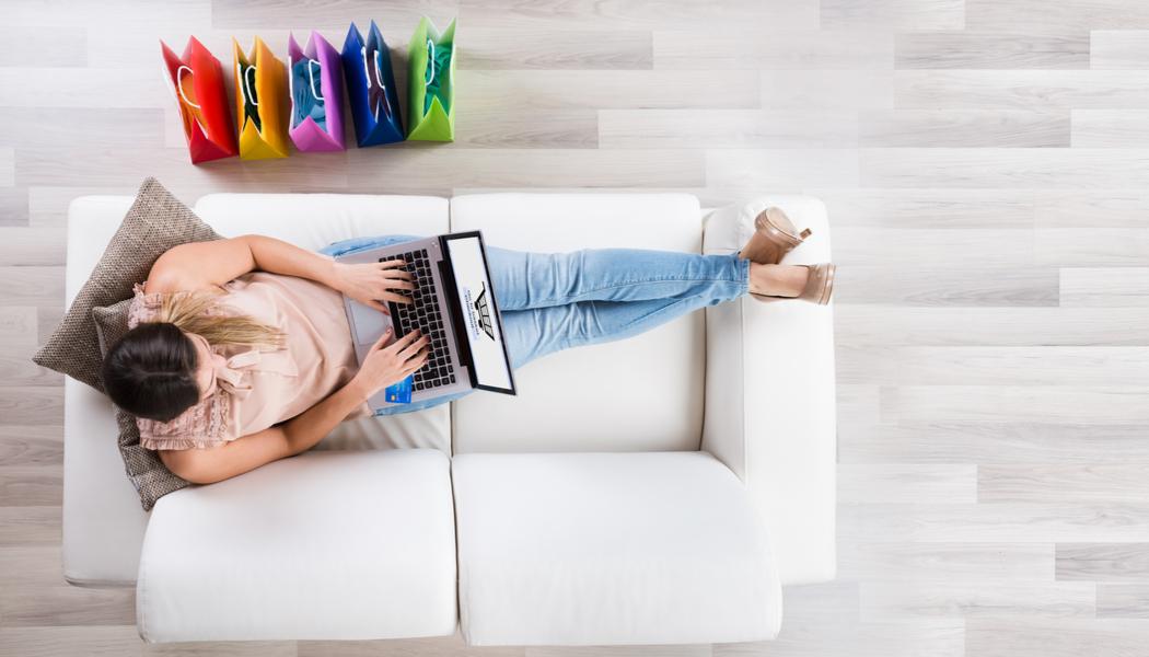 Woman shopping on her laptop for flooring options | Flooring Direct