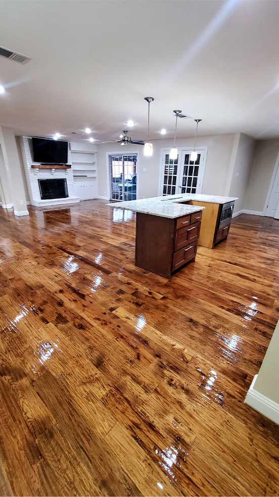Flooring Direct performs solid custom hardwood sand and finishing with this high-gloss finish.